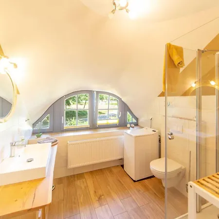 Im Reetdachhaus Prázdninový dům Ummanz