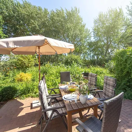 Im Reetdachhaus Prázdninový dům *